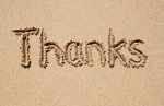 Thanks written in sand